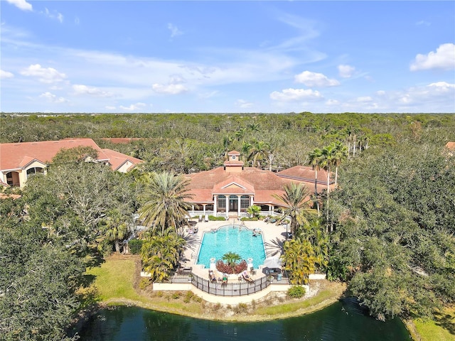 birds eye view of property featuring a water view