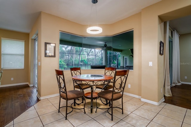 10534 Bermuda Isle Dr, Tampa, FL 33647 - dining area featuring light tile patterned flooring