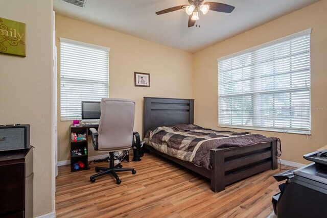10534 Bermuda Isle Dr, Tampa, FL 33647 - bedroom with ceiling fan and light hardwood / wood-style floors
