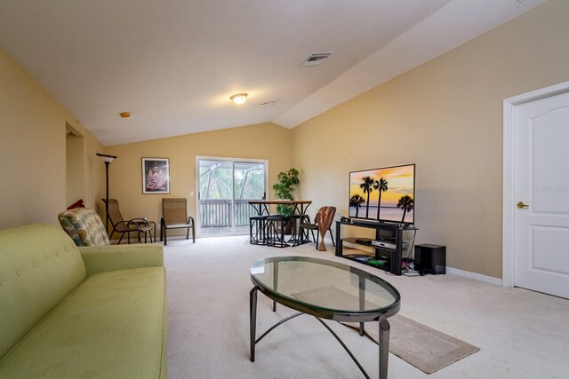 10534 Bermuda Isle Dr, Tampa, FL 33647 - living room with vaulted ceiling and light carpet