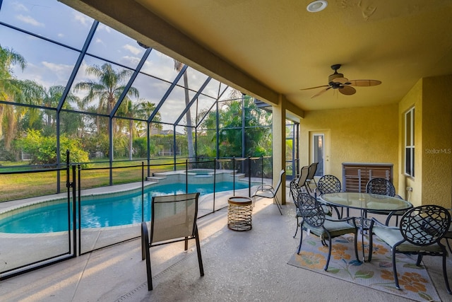 10534 Bermuda Isle Dr, Tampa, FL 33647 - view of swimming pool with a patio, a lanai, ceiling fan, and an in ground hot tub