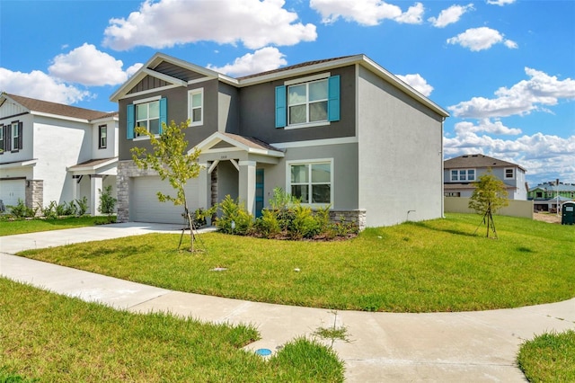 view of front facade featuring a garage and a front yard