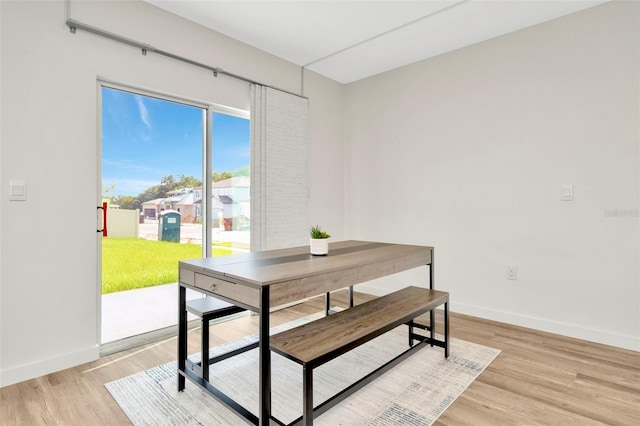 dining room featuring light hardwood / wood-style flooring