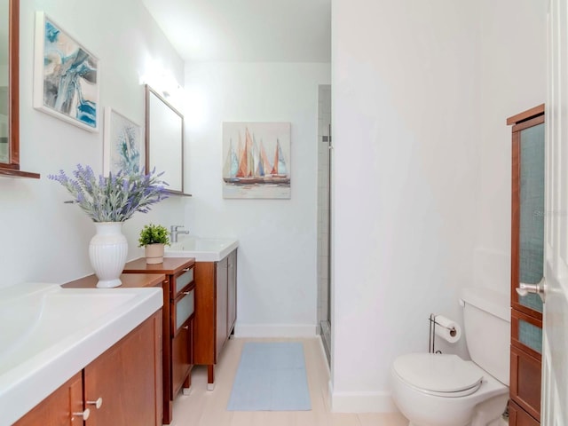 bathroom featuring walk in shower, vanity, and toilet