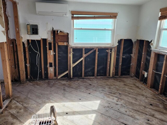 miscellaneous room featuring a wall mounted air conditioner