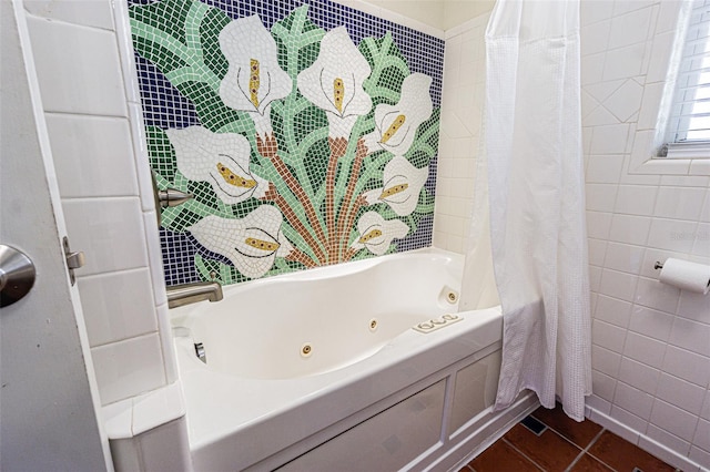 bathroom with tile walls, shower / tub combo, and tile patterned floors
