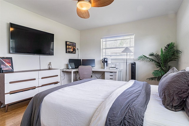 bedroom featuring light hardwood / wood-style floors and ceiling fan