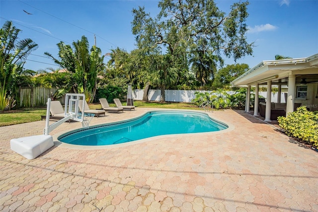 view of swimming pool featuring a patio area