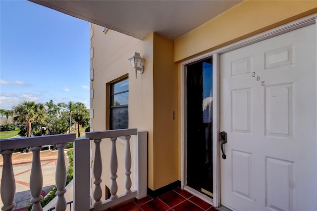 doorway to property featuring a balcony