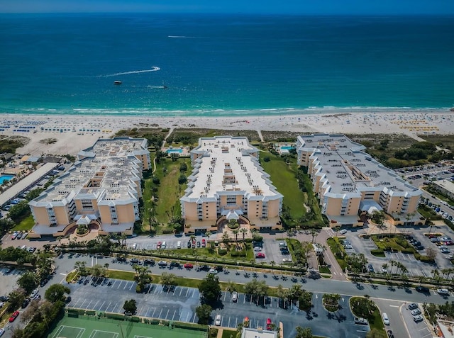 bird's eye view with a beach view and a water view