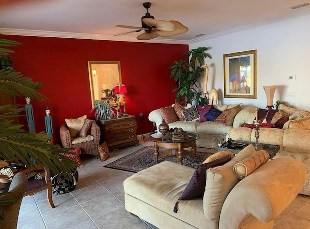 living room with tile patterned flooring, ornamental molding, and ceiling fan