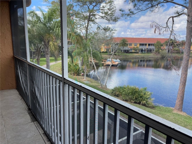 balcony featuring a water view