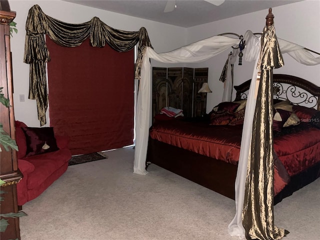 bedroom with ceiling fan and carpet flooring