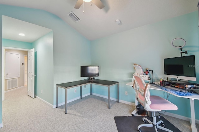 carpeted office with ceiling fan and vaulted ceiling