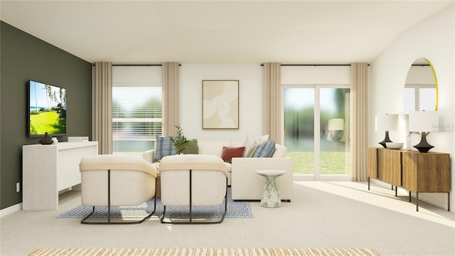 living room featuring lofted ceiling and carpet floors