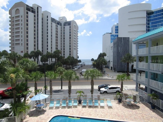 view of swimming pool with a patio area