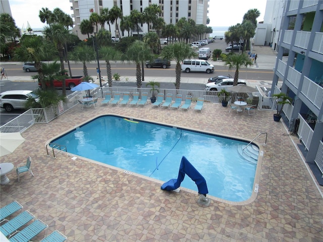 view of pool featuring a patio area