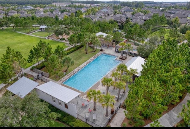 birds eye view of property with a residential view