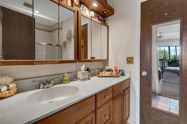 bathroom with vanity and walk in shower