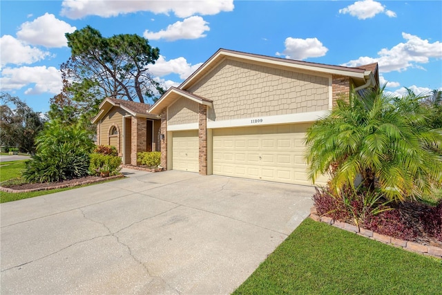 view of front of property with a garage