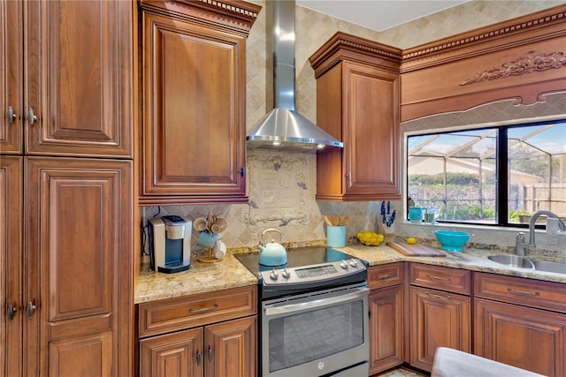 kitchen featuring electric stove, sink, tasteful backsplash, and wall chimney exhaust hood