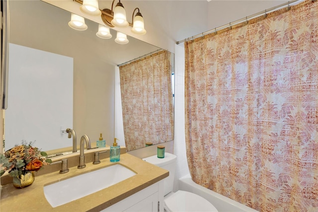 full bathroom featuring shower / tub combo with curtain, vanity, and toilet