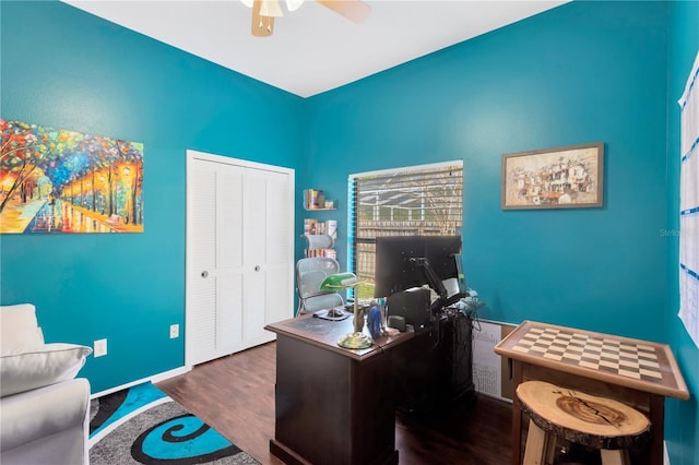 office area featuring dark hardwood / wood-style floors and ceiling fan