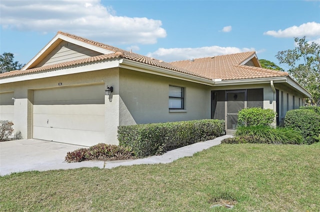 view of property exterior featuring a yard and a garage