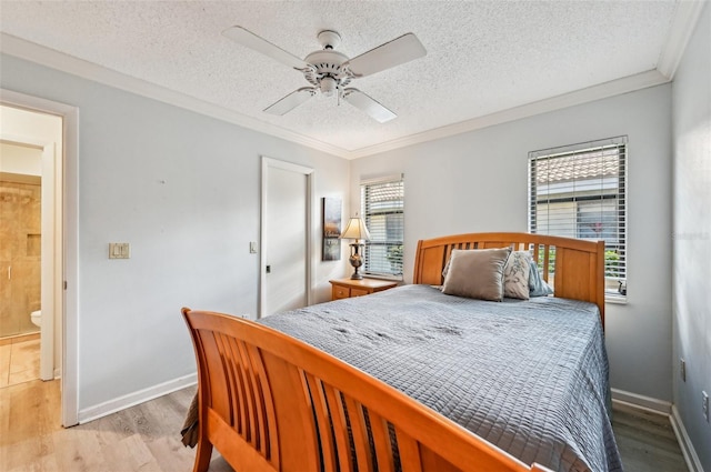 bedroom with ceiling fan, ornamental molding, a textured ceiling, and light wood-type flooring