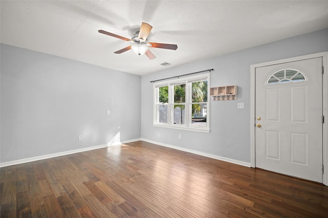 foyer entrance featuring dark hardwood / wood-style floors and ceiling fan