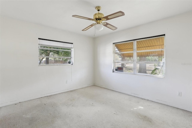 empty room featuring ceiling fan