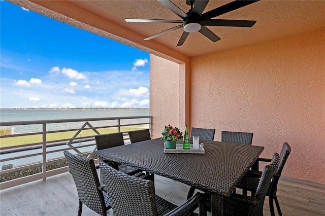 4951 Bacopa Ln S Unit 103, Saint Petersburg, FL 33715 - view of patio / terrace featuring a water view and ceiling fan