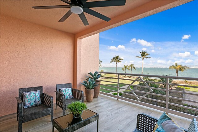4951 Bacopa Ln S Unit 103, Saint Petersburg, FL 33715 - balcony featuring ceiling fan and a water view