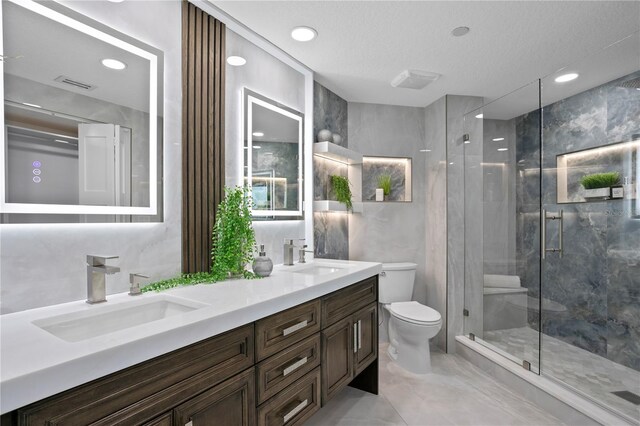 4951 Bacopa Ln S Unit 103, Saint Petersburg, FL 33715 - bathroom with vanity, a shower with door, and toilet