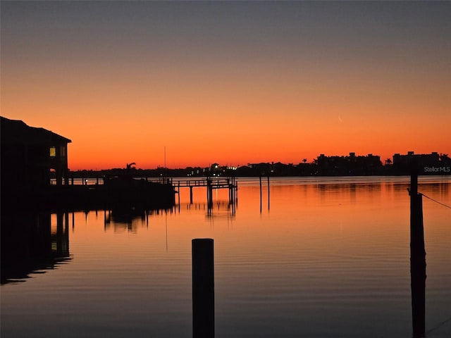 water view featuring a dock