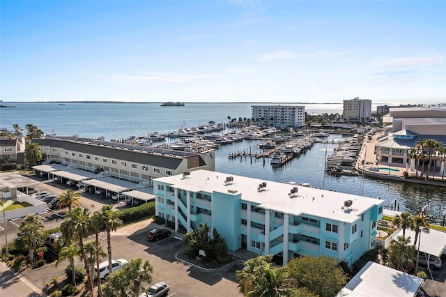 birds eye view of property with a water view