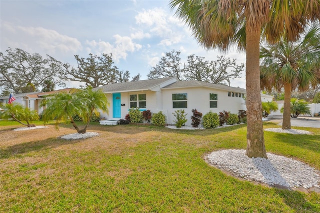 view of front of home featuring a front lawn