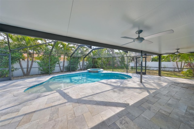 view of pool featuring a patio, a lanai, ceiling fan, and an in ground hot tub