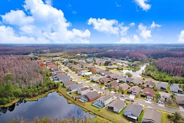 aerial view featuring a residential view and a water view