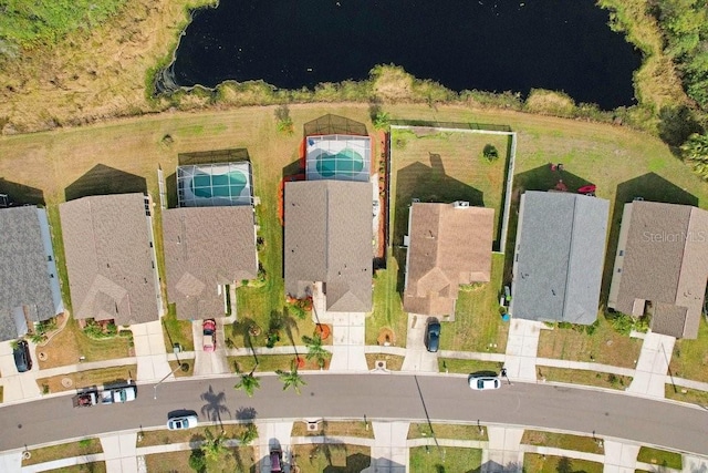 birds eye view of property with a residential view