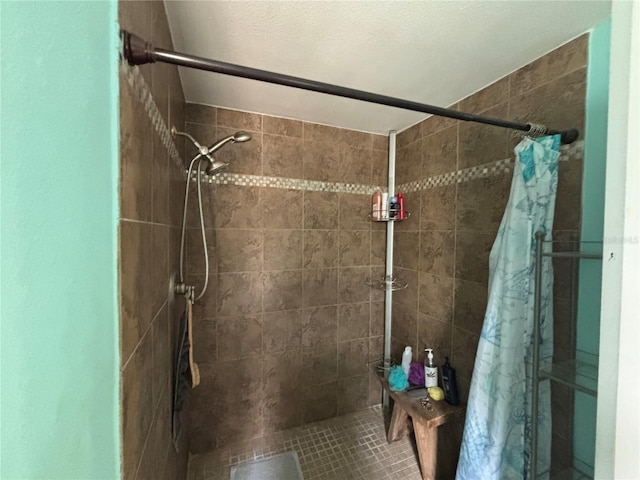 bathroom with a shower with shower curtain