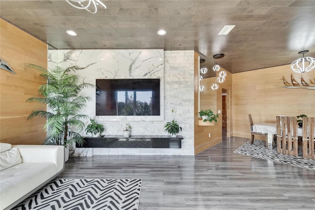 unfurnished living room featuring hardwood / wood-style flooring