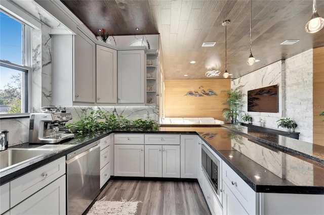 kitchen with white cabinetry, pendant lighting, wooden ceiling, and appliances with stainless steel finishes