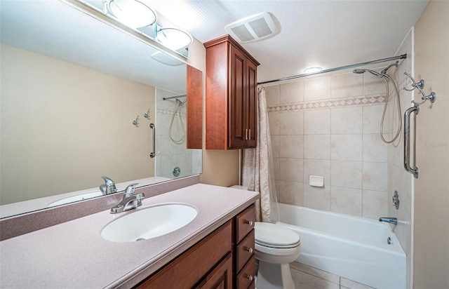 full bathroom featuring vanity, tile patterned flooring, shower / bath combination with curtain, and toilet