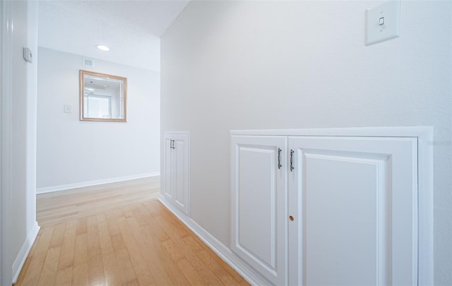 hallway featuring light hardwood / wood-style floors