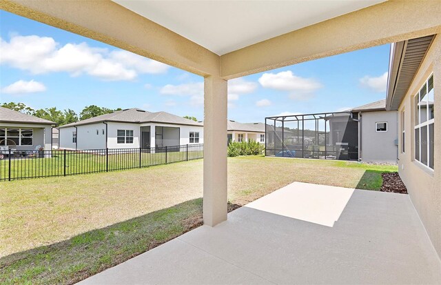 view of patio / terrace featuring a residential view and fence private yard