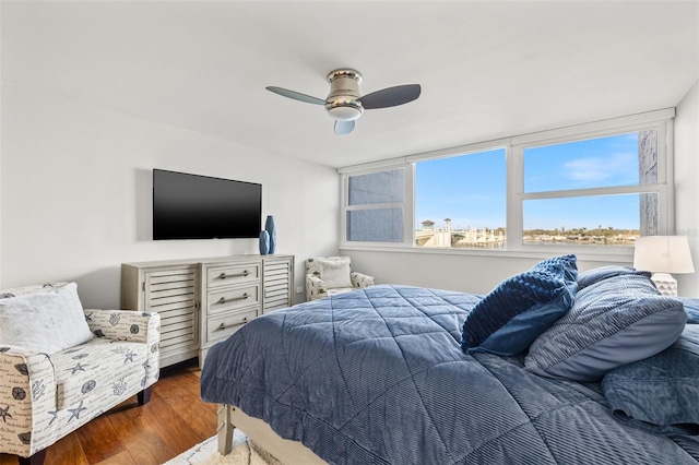 bedroom featuring ceiling fan and hardwood / wood-style floors