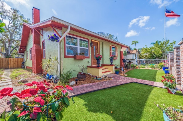 view of front of house featuring a fenced backyard