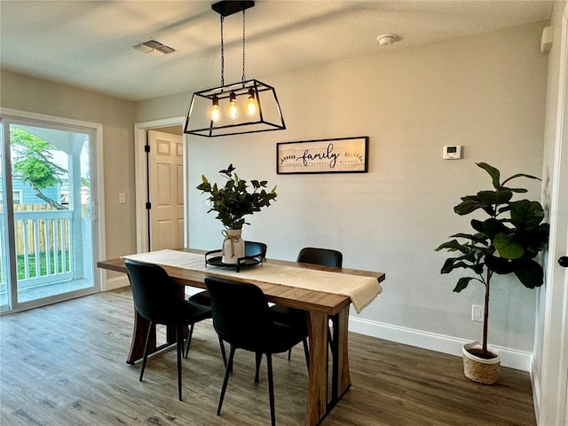 dining area featuring hardwood / wood-style flooring
