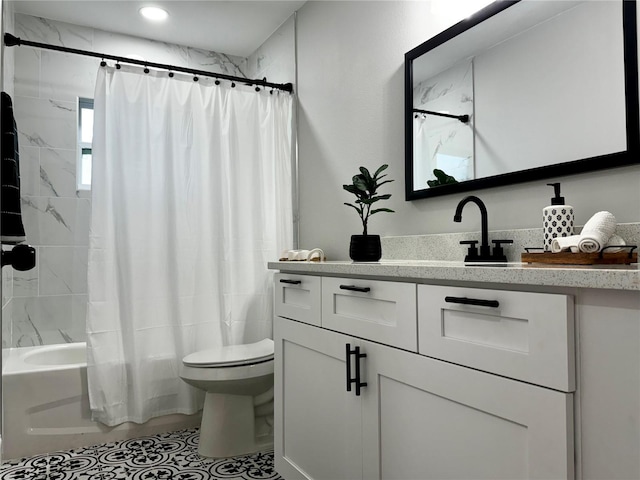 full bathroom with vanity, shower / bath combination with curtain, and toilet